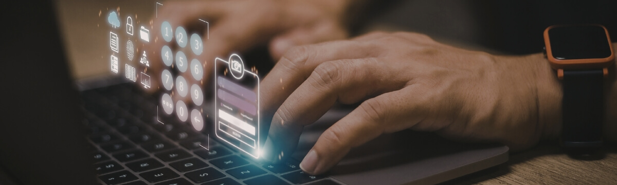 Hands typing on laptop with glowing AI digital icons, showing how artificial intelligence is built into everyday small business tools