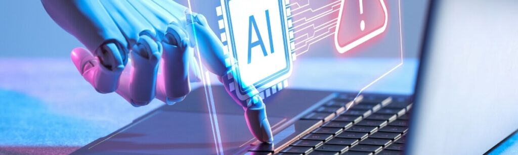 Robotic AI hand on laptop keyboard with glowing AI chip and warning symbol — artificial intelligence risks for small businesses