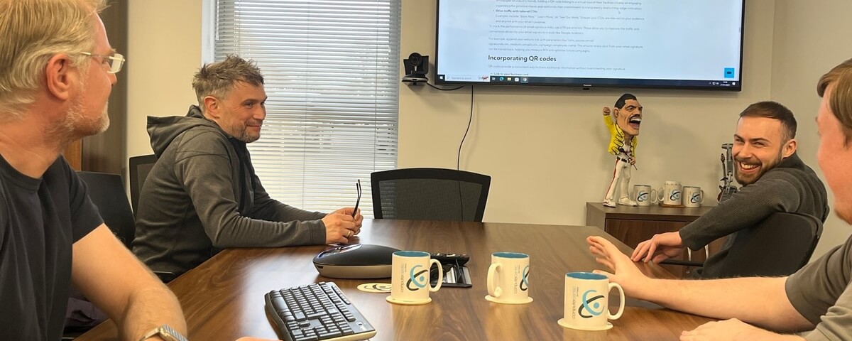 Computercentric IT support team in a meeting at the company office