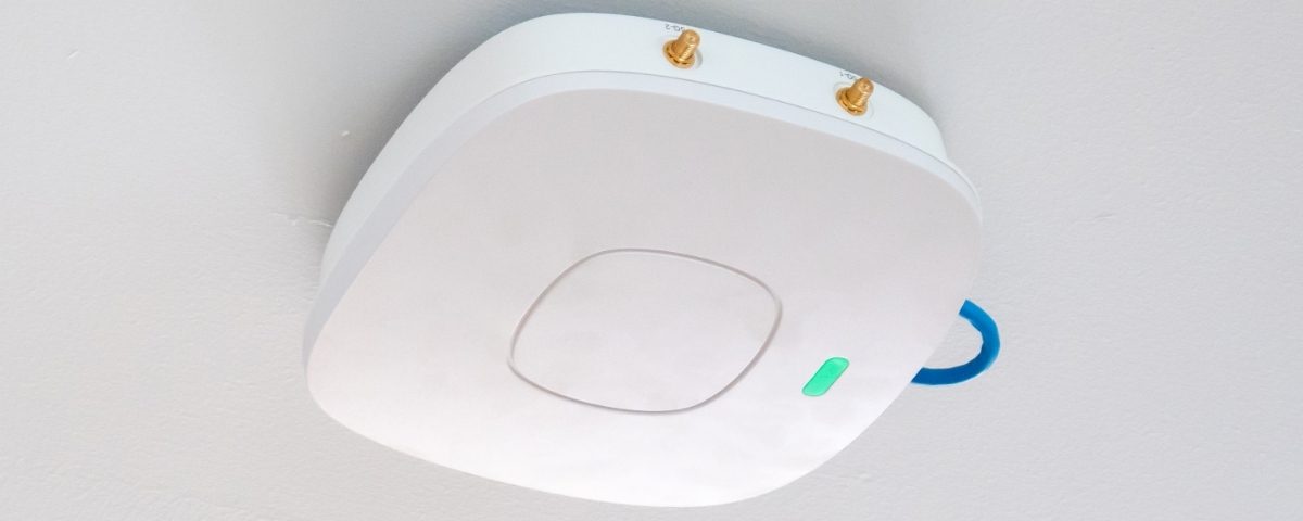 Ceiling-mounted wireless access point providing Wi-Fi in a healthcare building