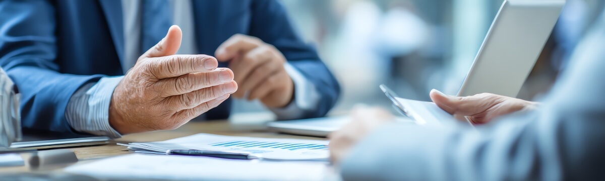 Business leaders discussing small business IT budget planning, support costs, and technology spending