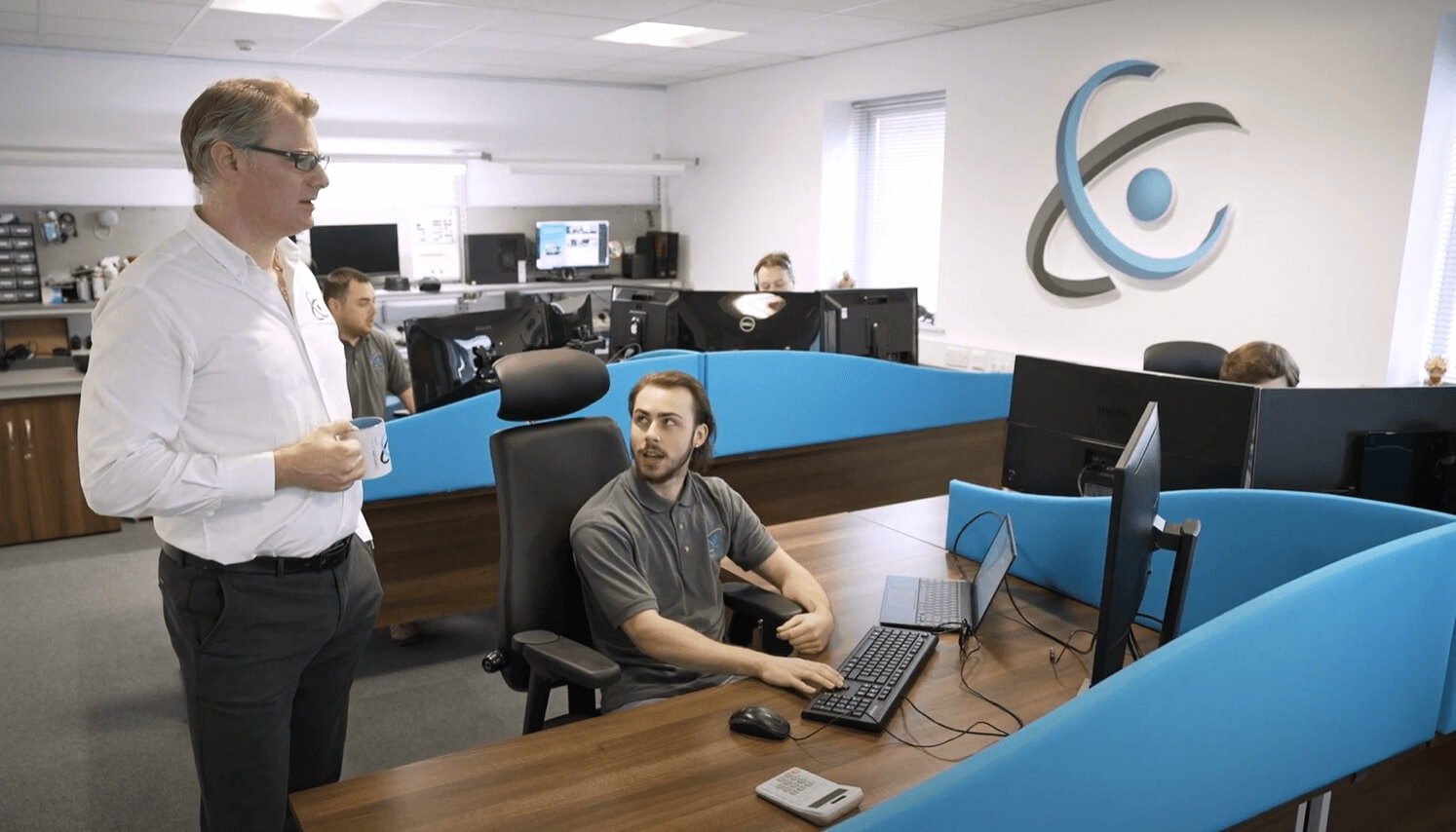 Computercentric IT support engineers working at their desks in the Aldridge office, where the team provides IT support for construction companies