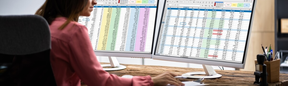 Business owner reviewing monthly IT support contract pricing, service inclusions and extra costs