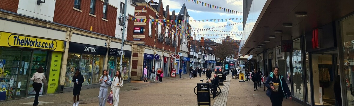 Sutton Coldfield town centre high street with shops and pedestrians